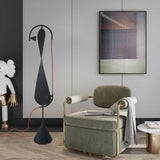 Black floor lamp with warm glow LED