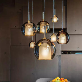 Metal pendant light with sleek modern silhouette