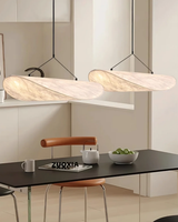 Sculptural Pendant Light Ribbon Silhouette Design