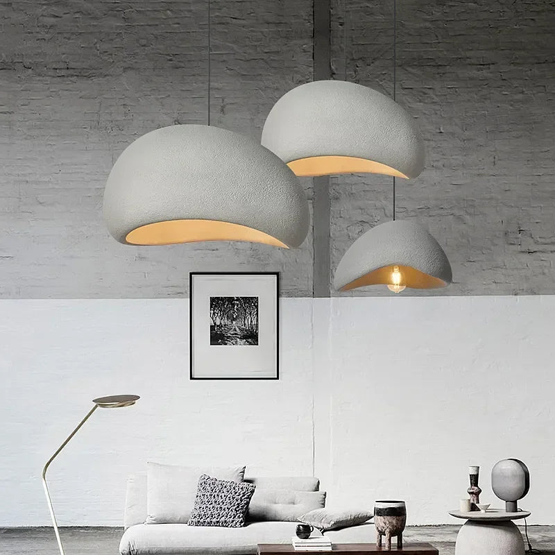 Brushed metal and glass pendant light fixture
