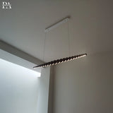 Varena linear pendant lamp wooden spheres close-up