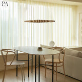 Wood pendant light side angle detail view