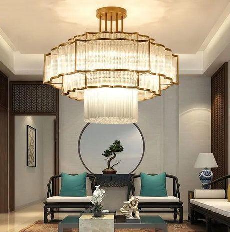 Multi-layered crystal pendant light with metal frame