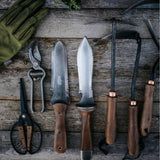 TrailForge Pro Grip Outdoor Survival Knife blade edge close-up - OpalDwell