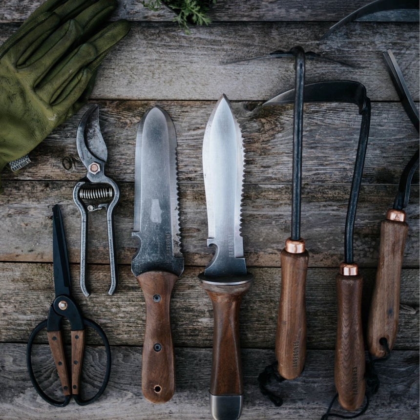 TrailForge Pro Grip Outdoor Survival Knife blade edge close-up - OpalDwell