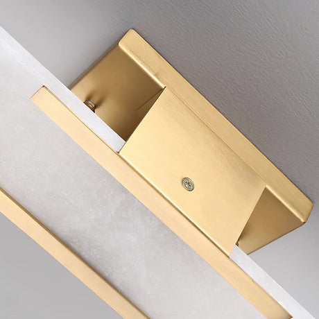 alabaster wall lamp with brass accents for living room decor