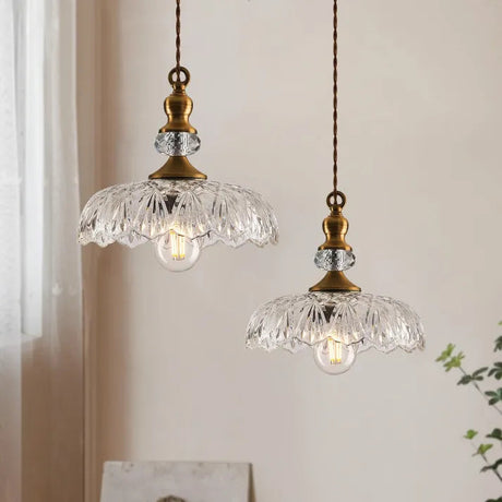 Pendant light casting halo glow in kitchen setting