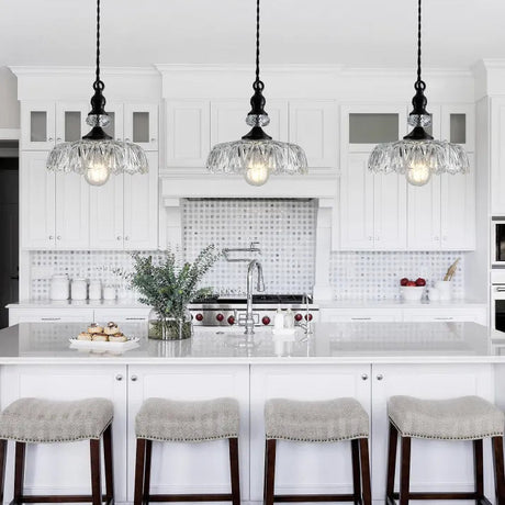 Pendant light illuminated above kitchen island