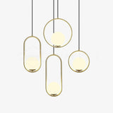 Glass Pendant Light Installed In Living Room Setting - OroDwell