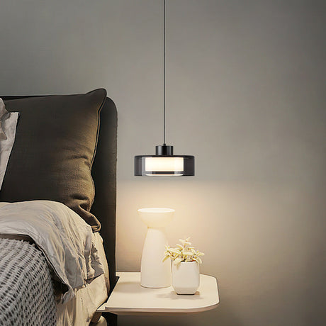 Spherical glass pendant light above bar area
