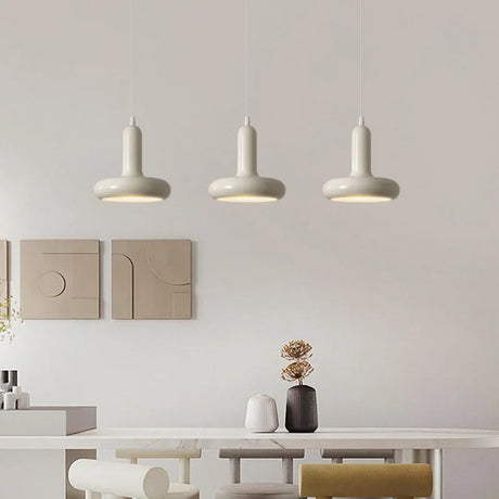 Expandable pendant light adjusted above kitchen counter