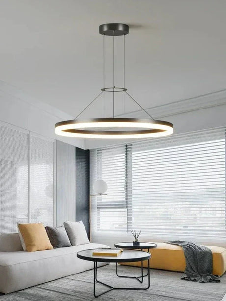 Metal pendant light with sleek modern silhouette