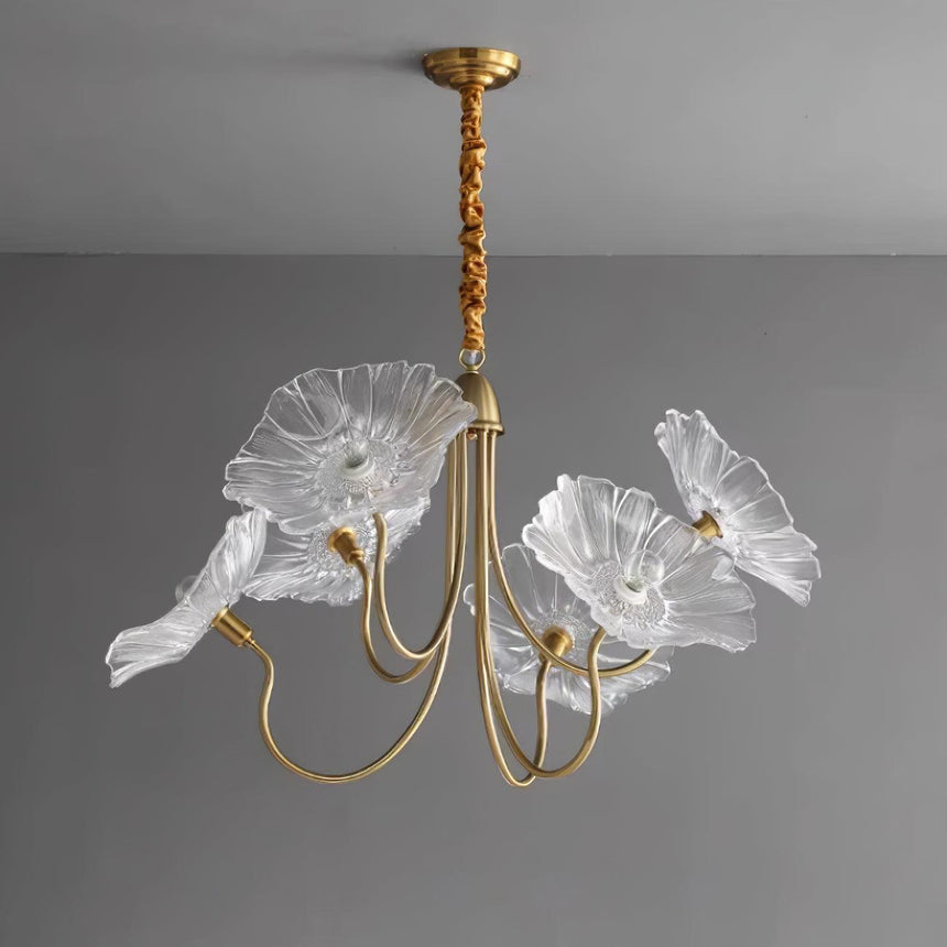 Glass chandelier installed above kitchen island