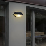 Wall light with warm functional glow for porches