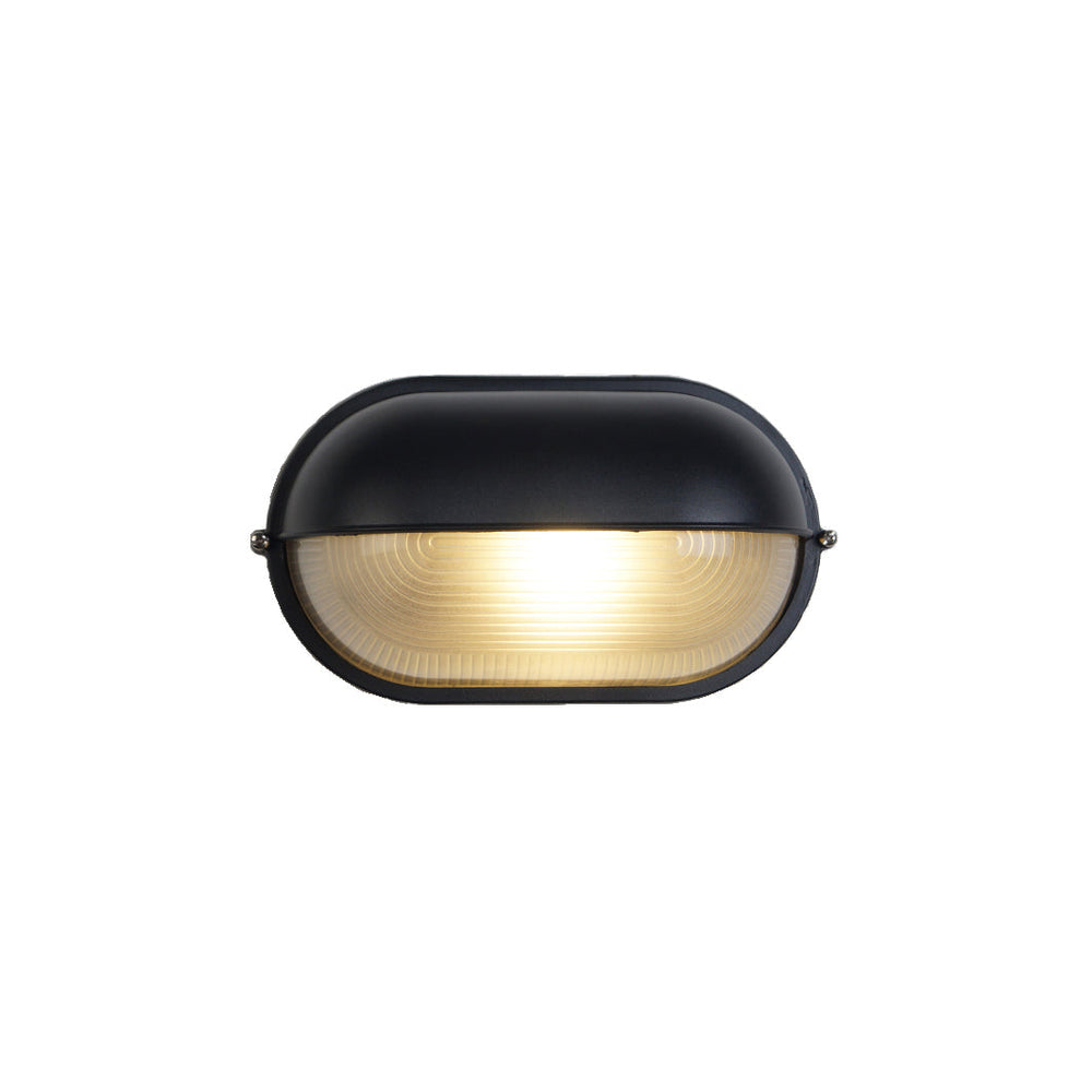 Glass wall lamp with industrial ribbed glass for outdoor spaces