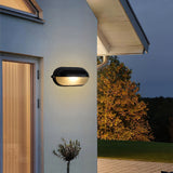 Industrial metal frame wall light for patios