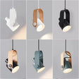 Clear metal pendant light with sleek modern silhouette