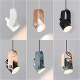 Clear metal pendant light with sleek modern silhouette