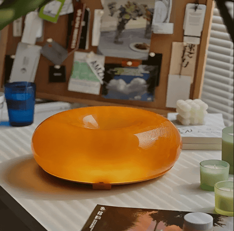 Warm Adjustable Glow Donut Lamp with Sleek Silhouette | OroDwell