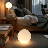 Garden globe light installed near patio seating