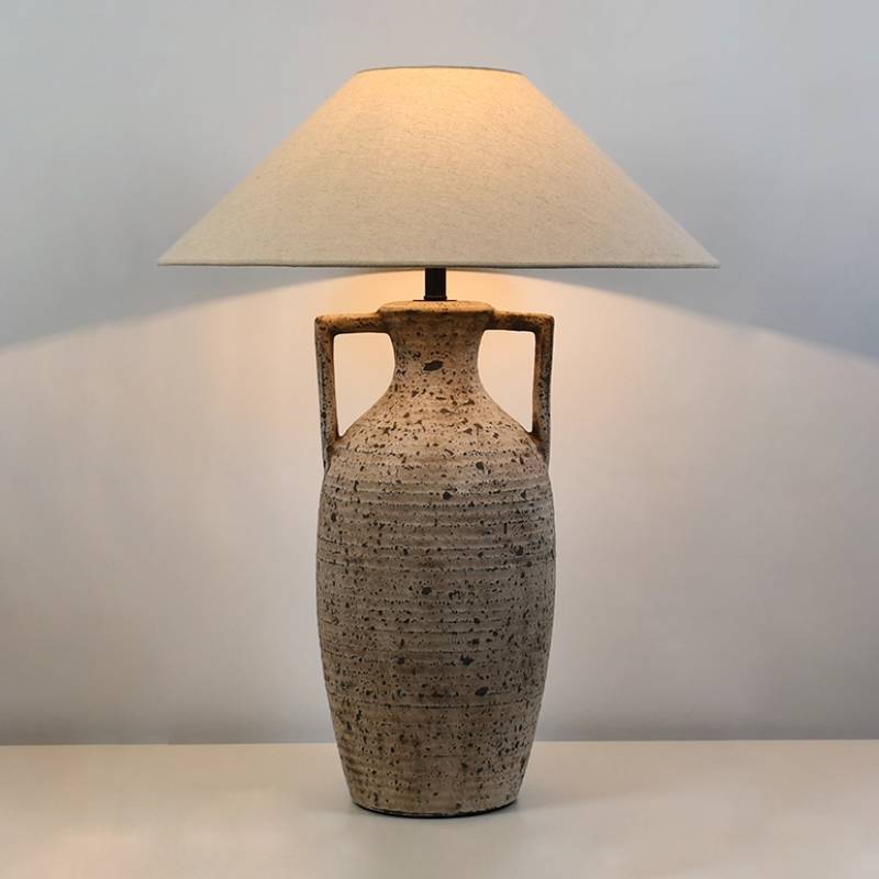 Textured ceramic table lamp with warm ambient lighting