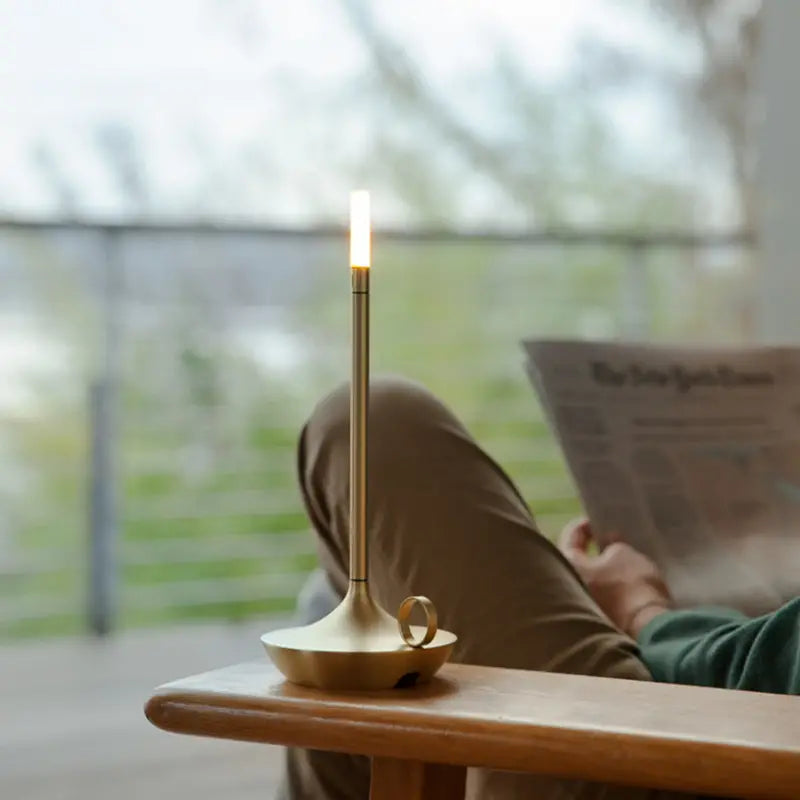 LumaCove candle-style LED table lamp charging port detail view