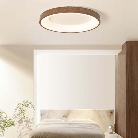 Wood ceiling light with circular ring silhouette