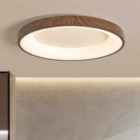 Wooden ceiling light illuminated in living room