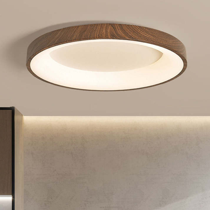 Wooden ceiling light illuminated in living room