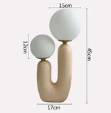 Glass and resin table lamp for contemporary home decor