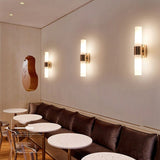 Compact wall sconce for small spaces