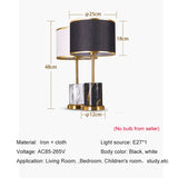 Fabric desk lamp gold frame accent detail