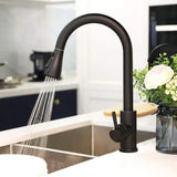 NoirFlow retractable tap close-up black finish