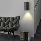 Stone and metal finish wall sconce detail