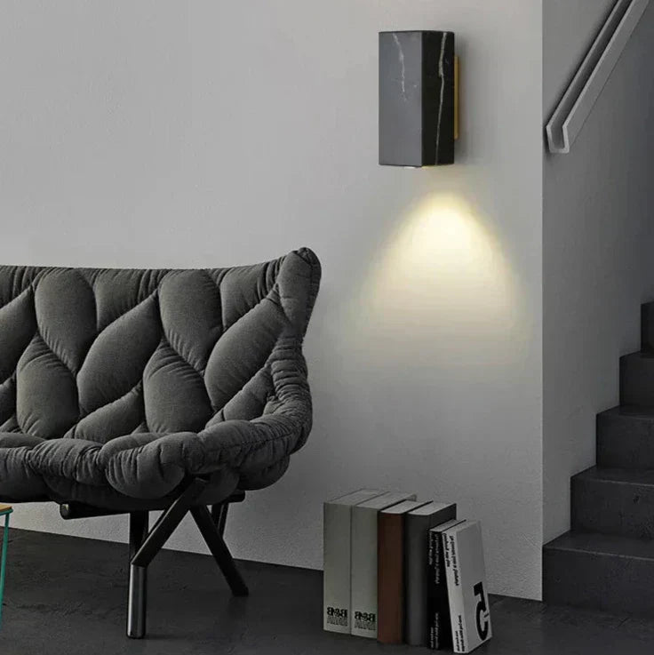 Stone and metal finish wall sconce detail