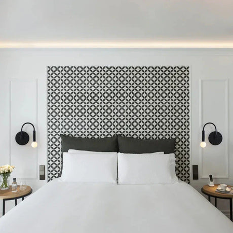 Wall mounted metal light with downward shade