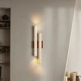 Perforated wall sconce for bedroom decor
