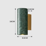 Close-up of painted metal sconce finish