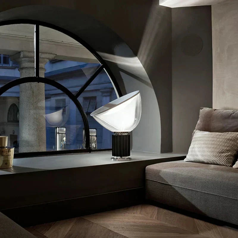 Aluminum and glass table lamp collection for living spaces