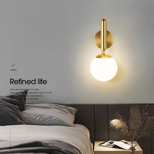 Metal and glass wall sconce for living room