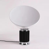 Table lamp on desk workspace setting