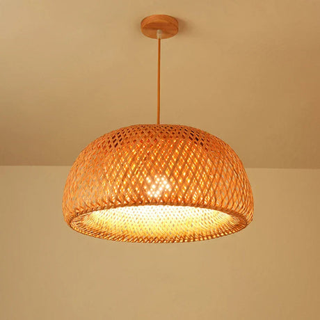Bamboo pendant hanging in dining setting