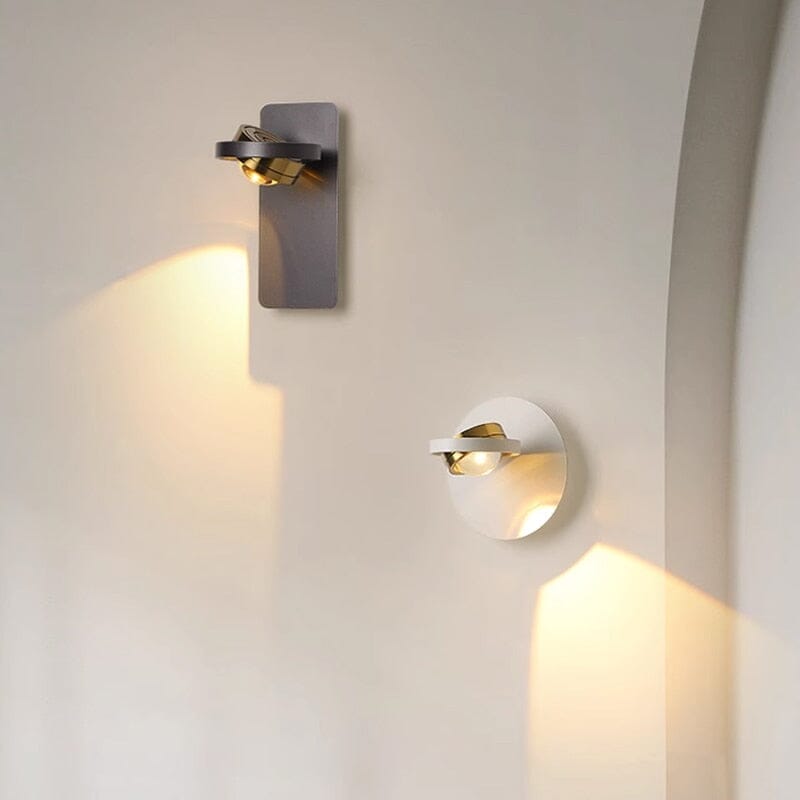 Wall lamp mounted beside a crib