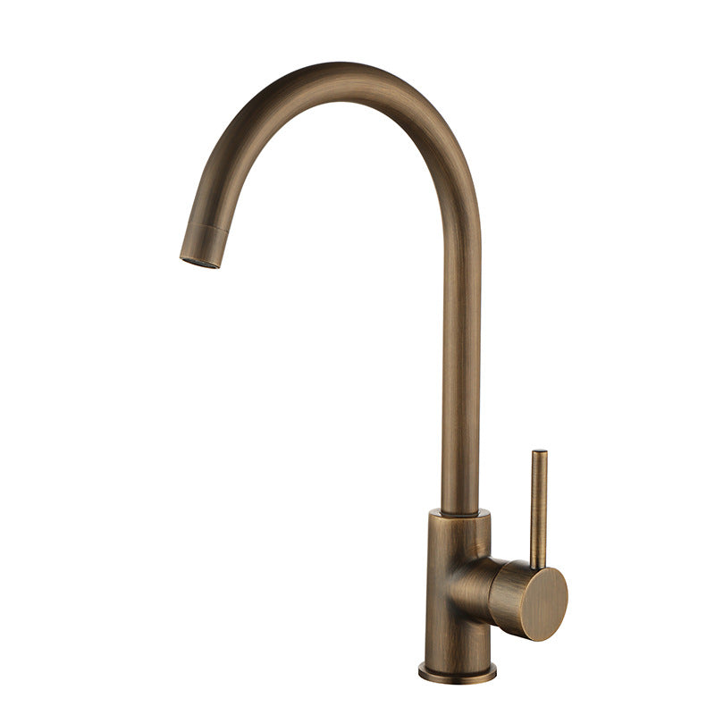 Antique bronze kitchen faucet installed in a kitchen setting