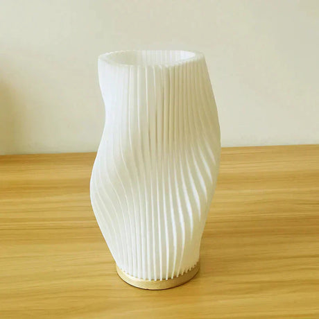 Rechargeable battery powered table lamp for flexible placement