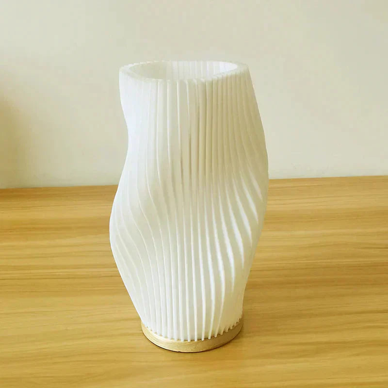 Rechargeable battery powered table lamp for flexible placement