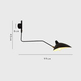 Rotating wall sconce for accent lighting