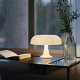 Table lamp with shade oriented up or down for mood lighting