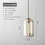 Glass pendant light with ring silhouette detail