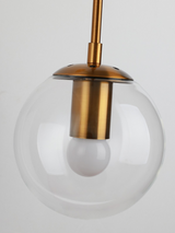 Gold finish wall sconce in a living room